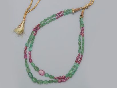 null Necklace on silk threads decorated with emeralds and pink sapphires, 750 MM,...