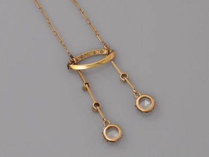 null Neglected" necklace in yellow gold, 750 MM, decorated with small pearls, central...