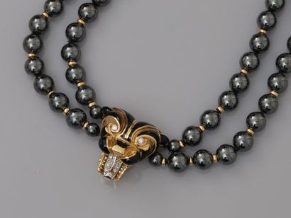 null Beautiful necklace of two rows of hematite pearls, joined by a panther head...