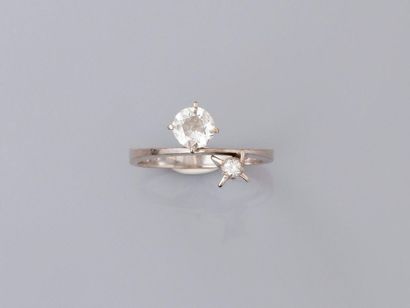 null Ring in white gold, 750 MM, set with two round diamonds, weight about 0.80 carat,...