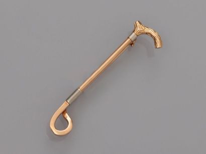 null Brooch barrette brooch drawing a cane and its pommel in gold, 585 MM, length...