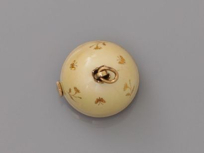 null BOREL Ernest. Pendant in ball covered with creamy white enamel strewn with yellow...