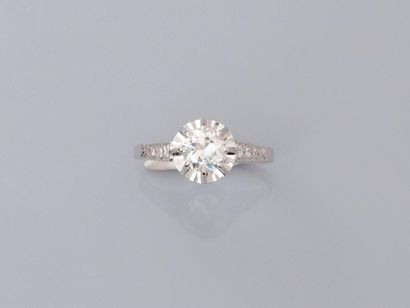 null Solitaire ring in white gold, 750 MM, set with a diamond weighing approximately...