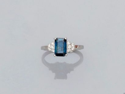 null Ring in white gold, 750 MM, set with an emerald cut sapphire weighing 1.40 carat,...