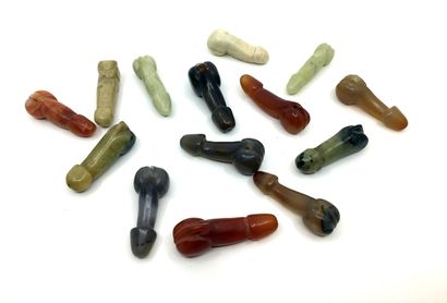null CHINA. 14 jade pendants of different colors, about 7 cm long each.