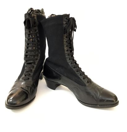 null Pair of lace-up boots.