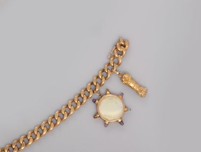  Bracelet deux breloques en or jaune, 750 MM, longueur 18,5 cm, poids : 39,5gr. ...