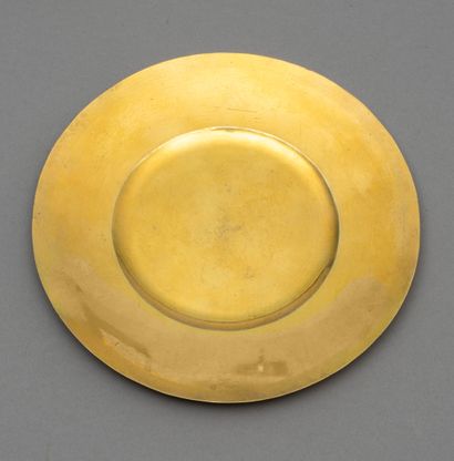 null Paten in gilt engraved with the initials IHS accompanied by the sun and the...