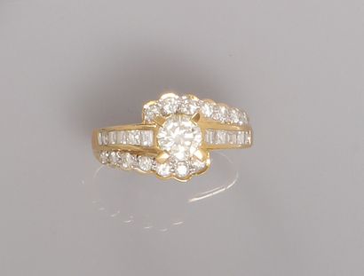 null Yellow gold solitaire ring, 750 MM, set with a diamond weighing approximately...