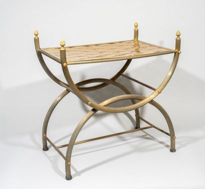 null 
 Curule chair

 Curule armchair in tapered brass decorated with pine cones,...