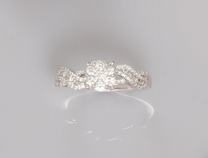null Ring in white gold, 750 MM, decorated with a flower and links covered with diamonds_x000B_,...