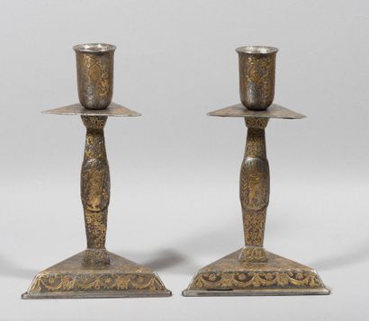 Rare pair of candlesticks in iron inlaid...