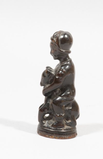 null Chess pawn in blackened wood carved

in the round; rider wearing a

helmet.

Hispanic...