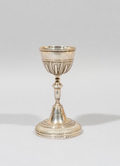 null Rare silver egg cup

The circular foot with gadroons, the cup decorated in the...