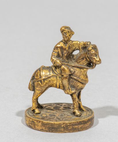 Chess rider in bronze, chased and

representing...