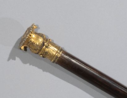 null Exceptional walking stick or cane in palm and vermeil.

The rod is girded in...