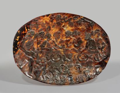 Tortoiseshell plaque carved in bas-relief...