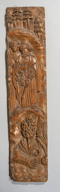 null Part of a panel

in walnut carved in

in high relief representing

characters...