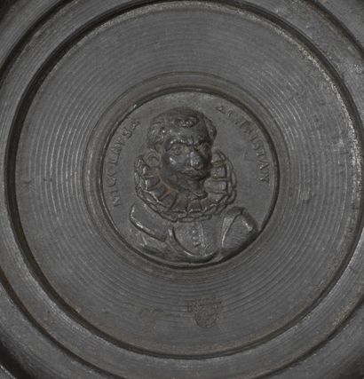 null Large pewter Temperance dish decorated in relief.

In the center, on the umbilicus,...