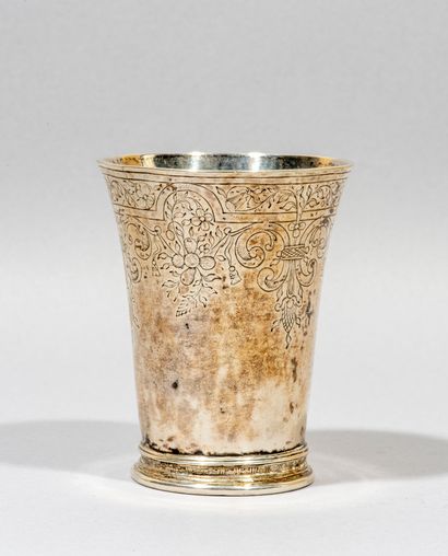 null Timbale with flared neck, engraved with acanthus and foliage, resting

on a...