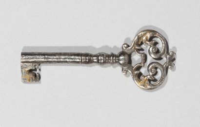 null Iron key with barrel decorated with foliage

intertwined.

France, early 18th...