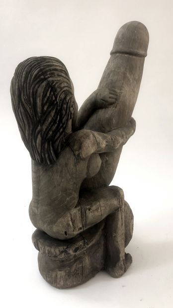 null INDONESIA. Ithyphallic figure, 20th century. Garden sculpture in wood, 63 x...