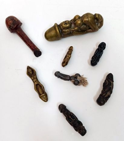 null EXOTISM. 8 amulets and phallic statuettes in bronze, wood and various. Various...