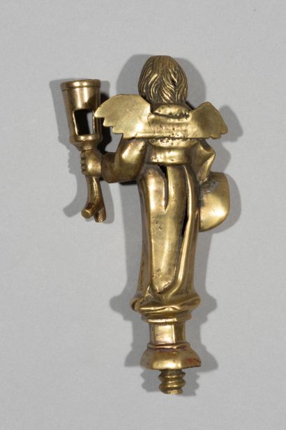 null Élément de chandelier à «boubesche»
en bronze.
A décor d’un tenant héraldique...