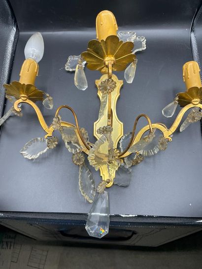 null An important lot of gilt brass sconces with glass pendants: a pair of large...