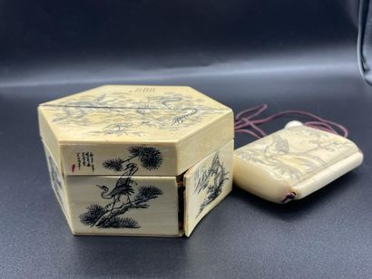 null Asia, 20th century
Lot including a small Indochinese box decorated with engraved...