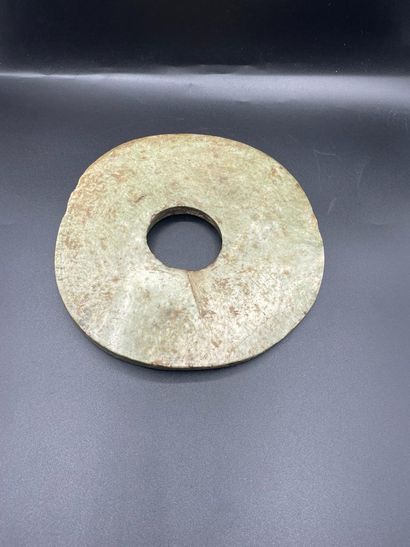 null Bi disc or coin, early 20th century
Serpentine
19.5 cm diameter at sight