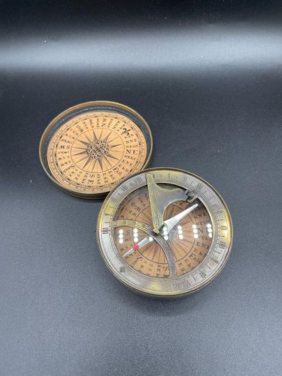 null Replica of a 17th-century brass sundial-compass. Diameter: 8.5 cm