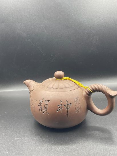 null Covered teapot with lotus flower decoration on the lid, lotus leaf pourer and...
