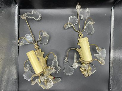 null A large lot of ormolu sconces with glass pendants: a suite of four sconces with...