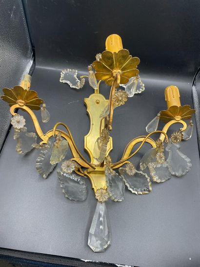 null An important lot of gilt brass sconces with glass pendants: a pair of large...