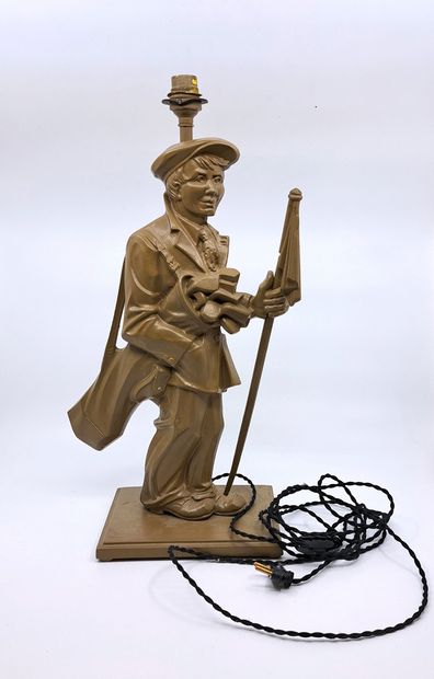 null GOLF. Golf player, 20th century. Sculpture in painted metal, 45 cm high. Lamp...