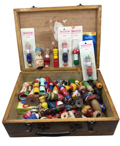 null ANCIENT GAME. A wooden case containing over 50 painted wooden knitting sets....