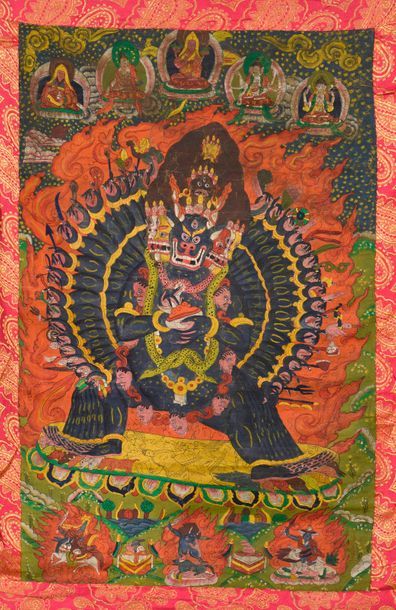 null Tangka illustrant Mahakala aux mille bras, entouré de flammes, la partie supérieure...