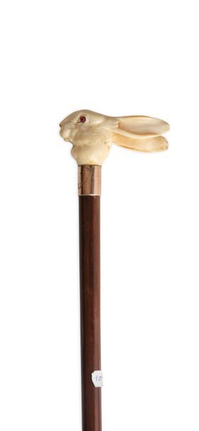 null Belle canne à pommeau droit en ivoire sculpté représentant une tête de lièvre....