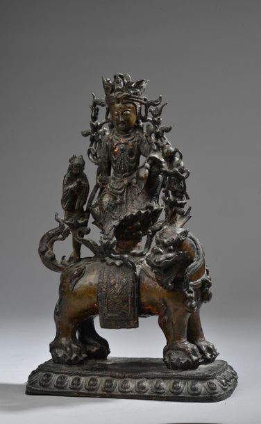 null CHINE - Époque MING (1368-1644).
Statuette de bodhisattva en bronze à patine...