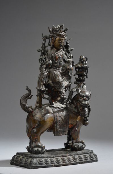 null CHINE - Époque MING (1368-1644).
Statuette de bodhisattva en bronze à patine...