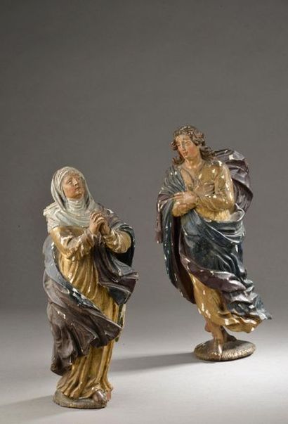 null Ensemble de deux statuettes en bois sculpté polychrome et doré figurant la Vierge...