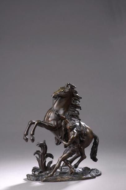 null D'après Guillaume I COUSTOU (1677 - 1746).

Cheval de Marly.

Bronze à patine...