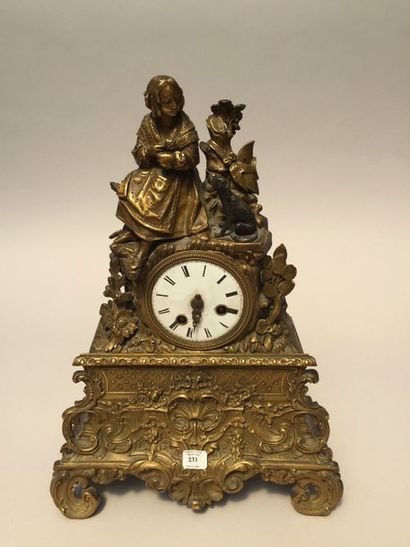 null Une horloge en bronze "Jeune fille au chien".