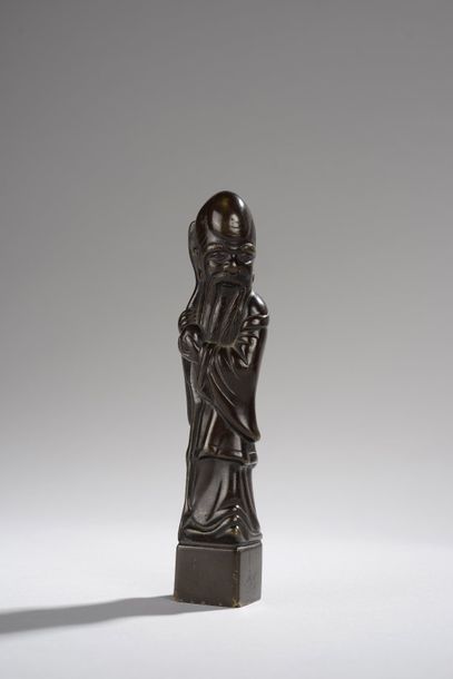 null Sceau en bronze représentant Shou Lao tenant sa pêche de longévité (traces d'usure)....