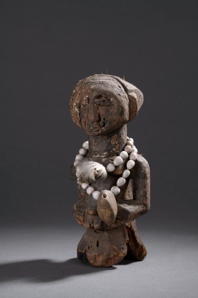 null Statuette | Nigeria, Yoruba

Bois et graines.