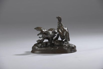 null D'après Jules MOIGNIEZ (1835 -1894).


Couple de perdrix nourrissant ses petits.


Bronze...