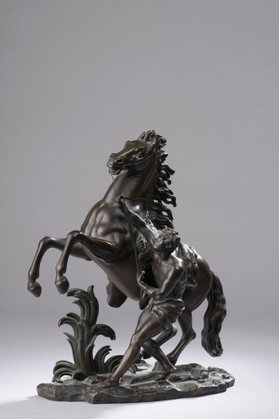 null D'après Guillaume I COUSTOU (1677 - 1746). 


Cheval de Marly. 


Bronze patiné...