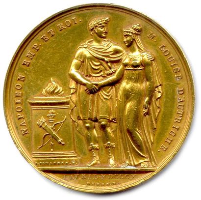 null Médaille en or 1810.
Têtes accolées à droite de Napoléon Ier lauré et de Marie-Louise...