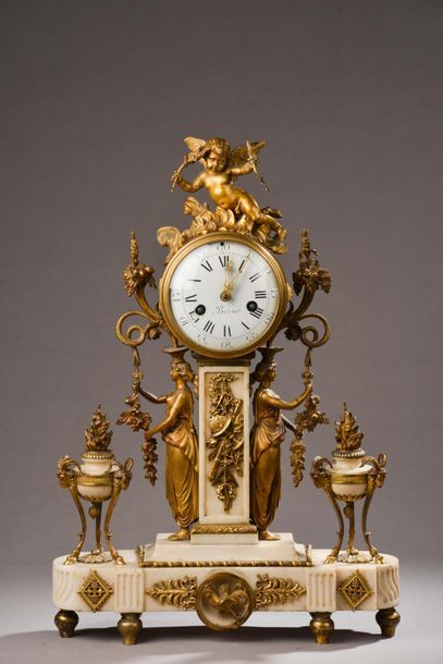 null Pendule en bronze doré et albâtre. D'époque Louis XVI Le cadran circulaire,...